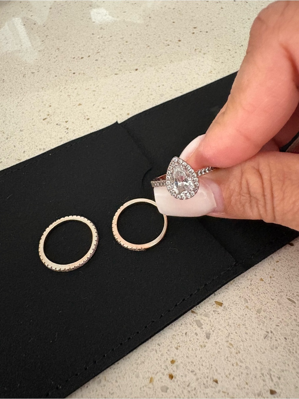Pear-Shaped Halo Ring with Clear Cubic Stones in Silver